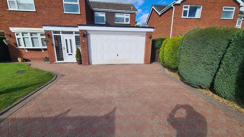 Driveway cleaning Macclesfield — high pressure wash removing moss and stains from block paving