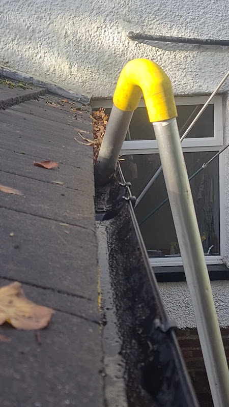 Gutter cleaning East Cheshire — clearing leaves moss and debris from gutters and downpipes